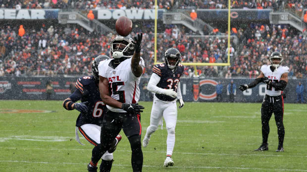 Dec 31, 2023; Chicago, Illinois, USA; Atlanta Falcons wide receiver Van Jefferson (15) attempts to make a catch over Chicago Bears cornerback Kyler Gordon (6) during the first half at Soldier Field.